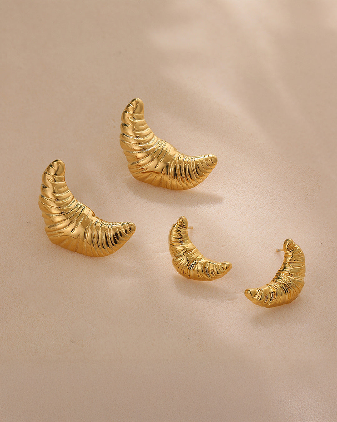 Warm Croissant Studs